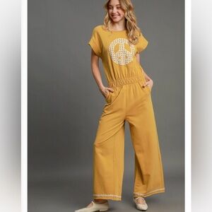 New nwt Umgee Yellow Jumpsuit with Peace Sign pants S M L